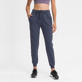 The Stretcher Ankle-Tied Cropped Fitness Pants